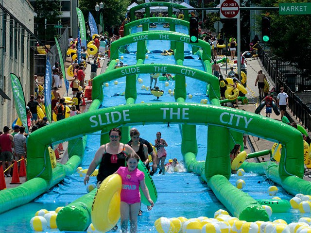 Products - Slide The City - 300 Meters Long Giant Inflatable Water ...